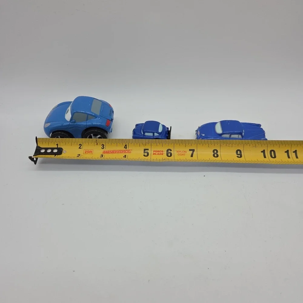 Lot 13 Disney Pixar Cars Toys Mater Hudson Chick Hicks Luigi Piston Trophy
